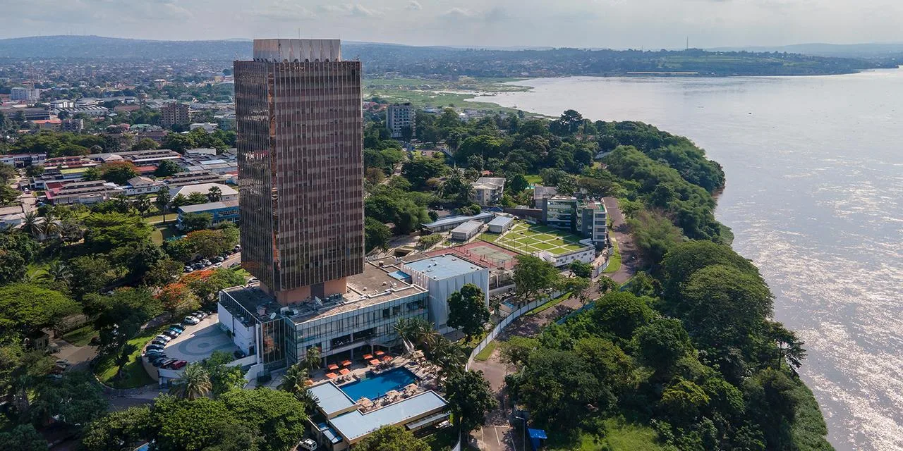 Democratic Republic of the Congo riverside city skyline from above